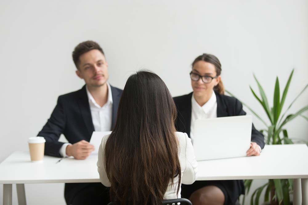 headhunters-interviewing-female-job-candidate